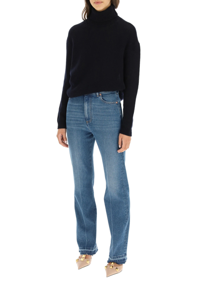 Shop Valentino High Waisted Flare Jeans In Blue