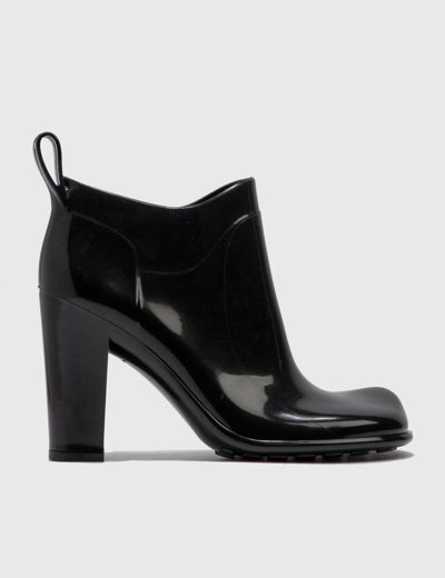 Shop Bottega Veneta Rubber Ankle Boot In Black