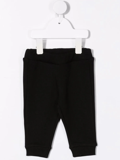 Shop Balmain Logo-print Cotton Trousers In Black