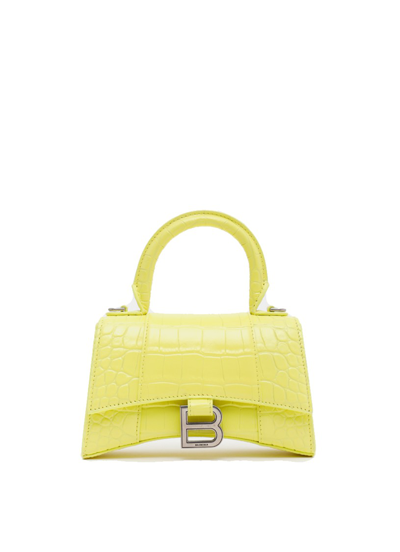 Shop Balenciaga Hourglass Xs Top Handle Bag In Yellow