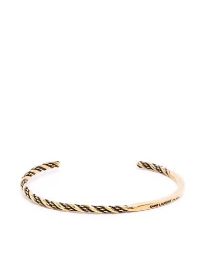 Shop Saint Laurent Thin Twisted Bracelet In Gold