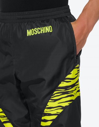 Shop Moschino Tiger Details Nylon Jogging In Black