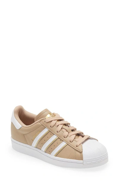 Shop Adidas Originals Superstar Sneaker In White/ St Pale Nude/ Gold Met.
