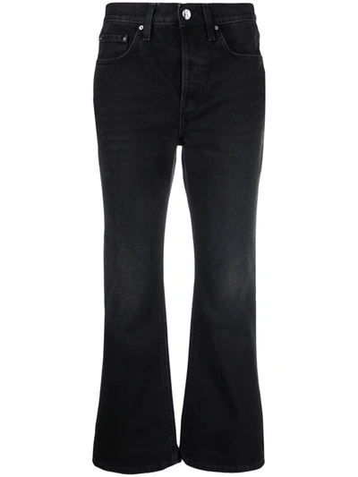 Shop Totême Cropped Kick Flared Jeans In Black