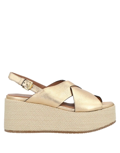 Shop Carmens Sandals In Gold