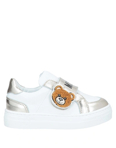 Shop Moschino Teen Sneakers In White