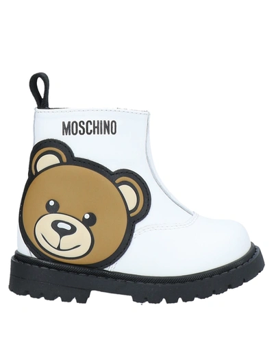 Shop Moschino Baby Ankle Boots In White