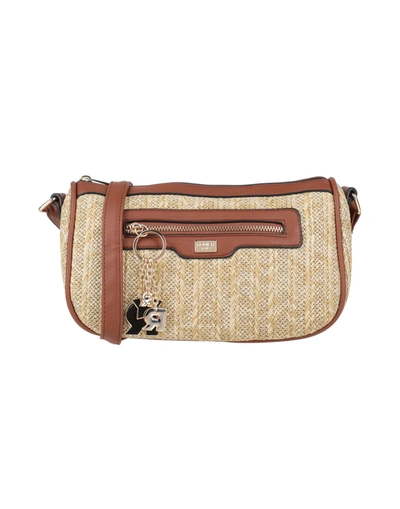 Shop Rodier Handbags In Beige