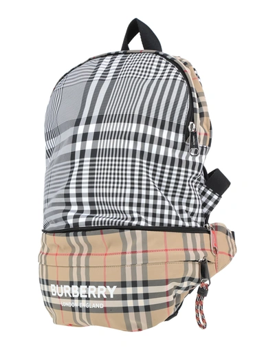 Shop Burberry Backpacks In Beige