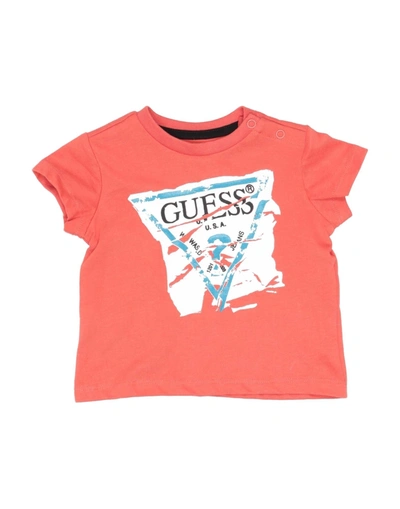 Guess T-shirts In Orange