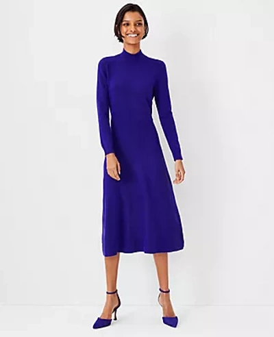 Shop Ann Taylor Petite Midi Flare Sweater Dress In Rich Ultraviolet