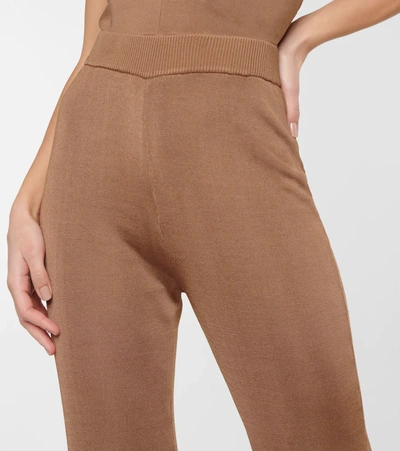 Shop Staud Moonstone High-rise Flared Pants In Tan