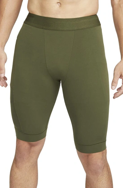 Shop Nike Dri-fit Yoga Shorts In Rough Green/ Black
