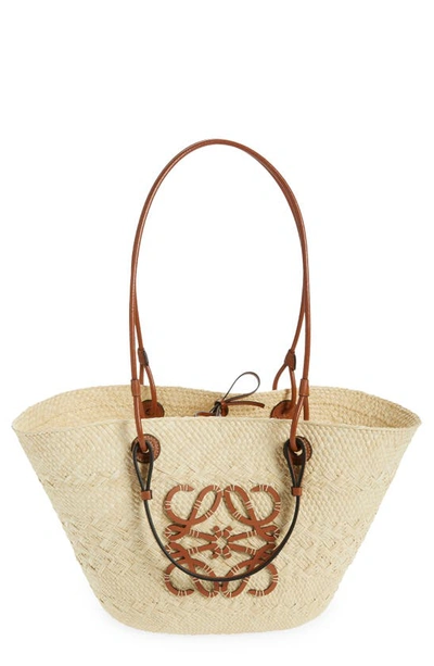 Shop Loewe X Paula's Ibiza Anagram Iraca Palm Basket Bag In Natural/ Tan