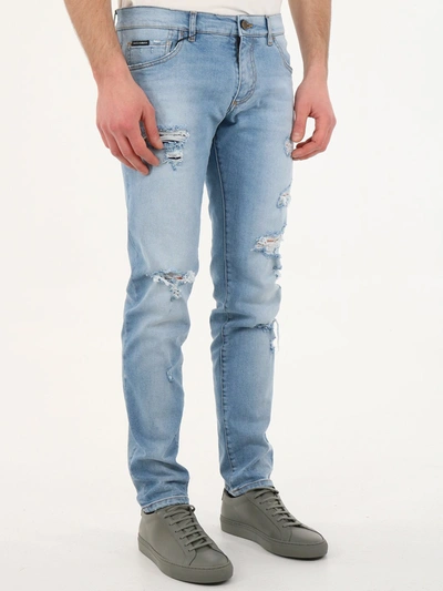Shop Dolce & Gabbana Skinny Jeans With Rips In Blu