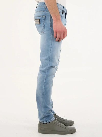 Shop Dolce & Gabbana Skinny Jeans With Rips In Blu