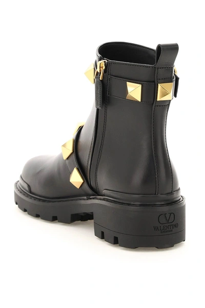 Shop Valentino Garavani Roman Stud Leather Ankle Boots In Black