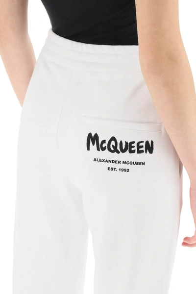 Shop Alexander Mcqueen Mcqueen Graffiti Sweatpants In White,black