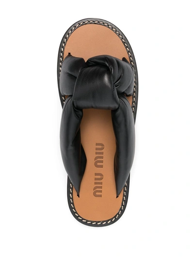 Shop Miu Miu Leather Knot Sandals In Black