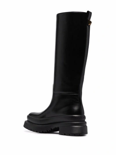 Shop Valentino Roman Stud Leather Boots In Black