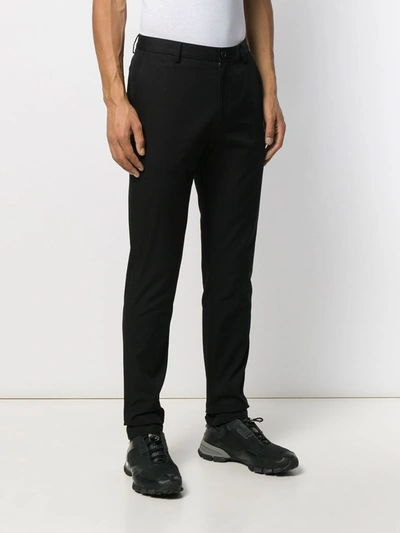 Shop Burberry Cotton Chinos In Black