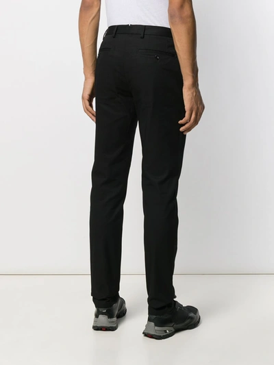 Shop Burberry Cotton Chinos In Black