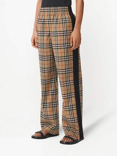 Shop Burberry Checked Cotton Trousers In Beige