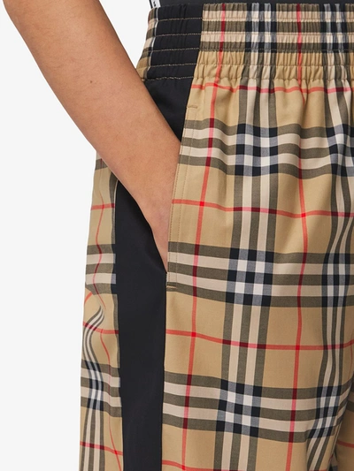 Shop Burberry Checked Cotton Trousers In Beige
