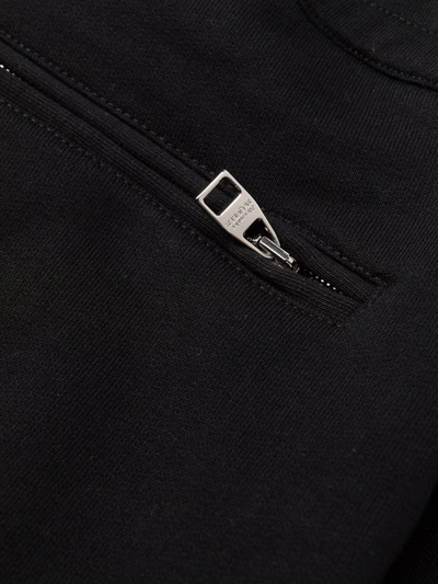 Shop Alexander Mcqueen Logo Jogger Trousers In Black