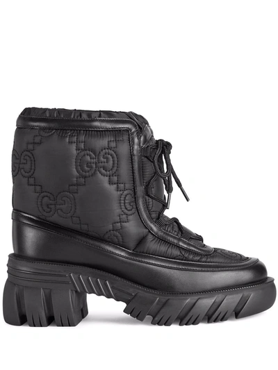 Shop Gucci Gg Pattern Boots In Schwarz