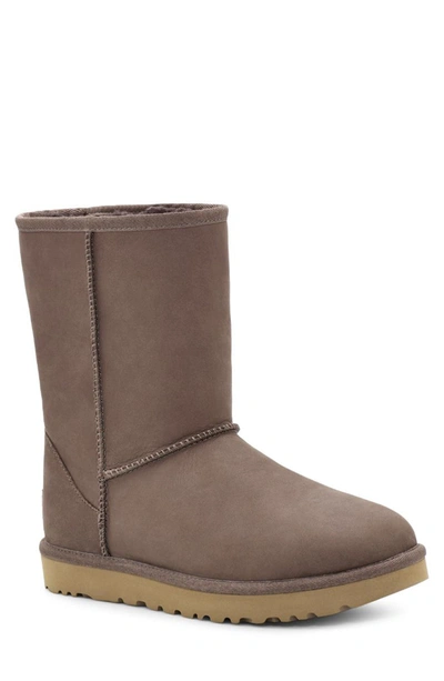 Shop Ugg Classic Short Leather Water Resistant Boot In Brownstone