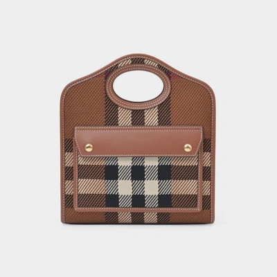 Shop Burberry Mini Pocket Bag Aus Braunem Canvas In Brown