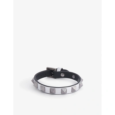 Shop Valentino Rockstud Metallic Leather Bracelet In Silver/nero