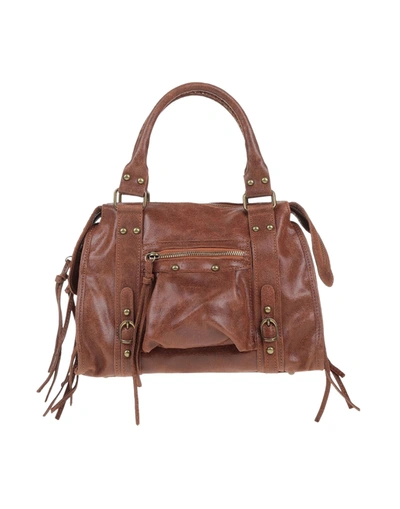 Shop Maury Handbags In Tan