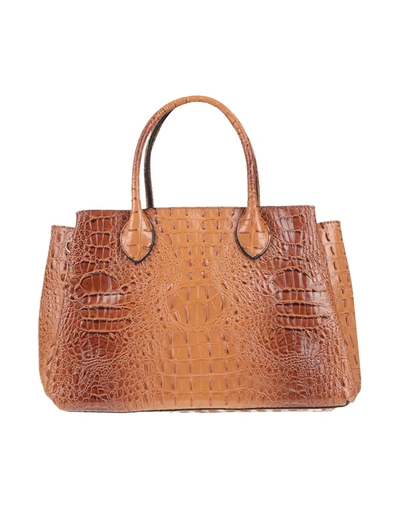 Shop Maury Handbags In Tan