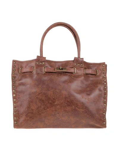 Shop Maury Handbags In Tan