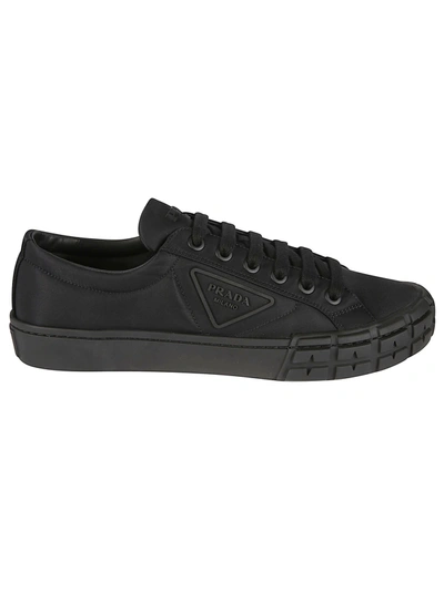 Shop Prada Side Logo Stamped Sneakers In Nero