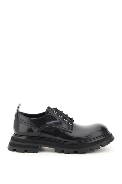 Shop Alexander Mcqueen Wander Leather Lace-up Shoes In Black