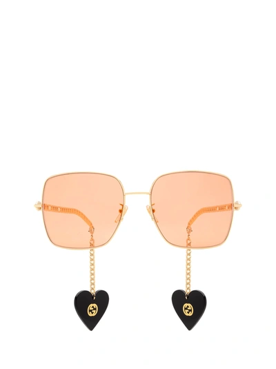 Shop Gucci Gg0724s Gold Sunglasses