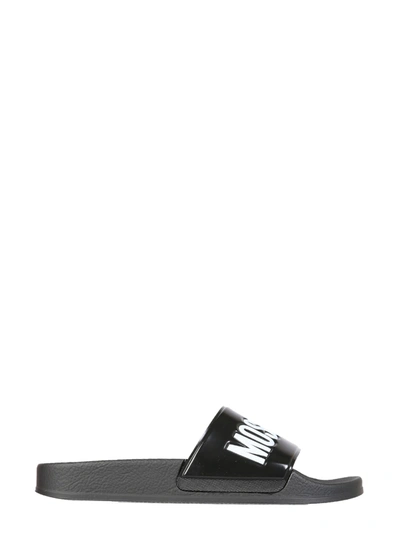 Shop Moschino Slide Sandals With Logo In Nero Bianco