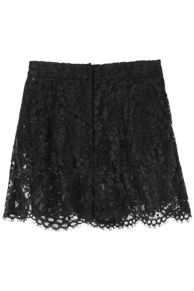 Shop Dolce & Gabbana Laminated Lace Shorts In Nero