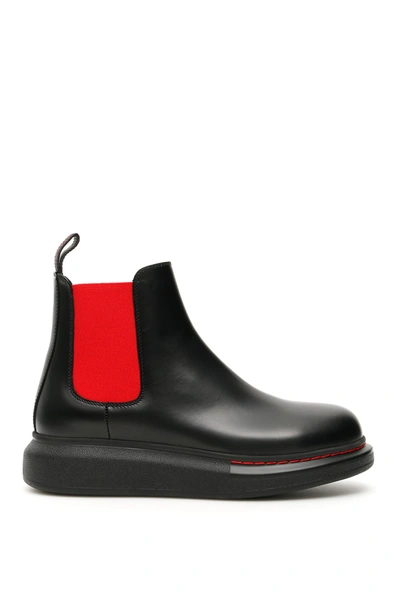 Shop Alexander Mcqueen Chelsea Hybrid Boots In Black/red