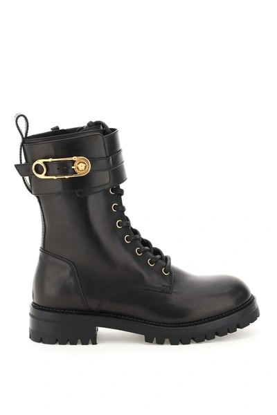 Shop Versace Combat Boots With Medusa Safety Pin In Nero