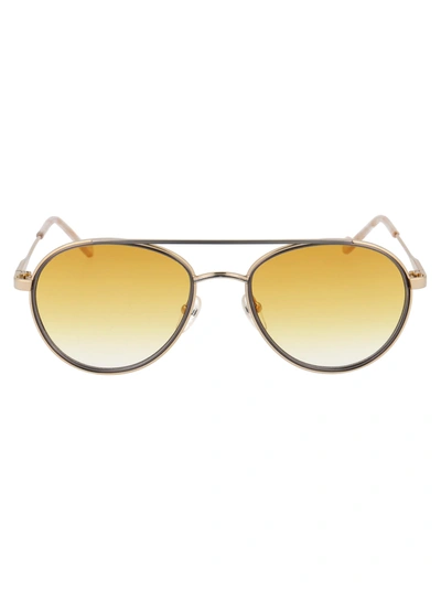 Shop Liu •jo Lj119s Sunglasses In 704 Gold Pewter