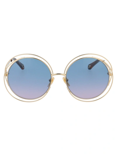 Shop Chloé Ch0045s Sunglasses In 006 Gold Gold Blue