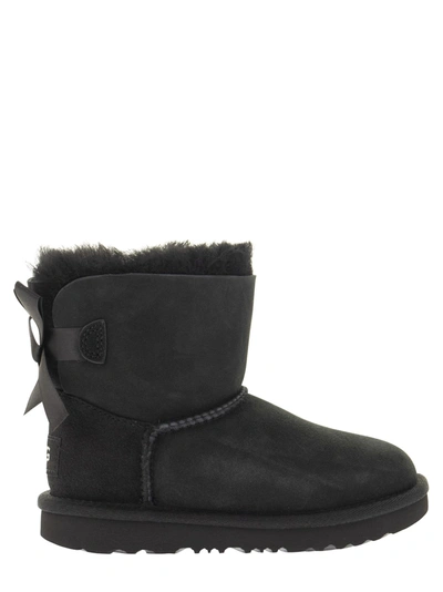 Shop Ugg Mini Bailey Bow Ii - Ankle Boot In Black