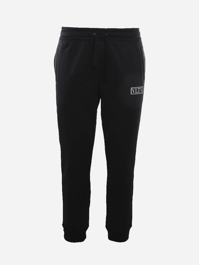 Shop Valentino Cotton Blend Trousers With Vltn Tag In Nero