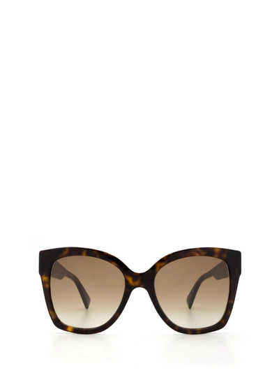 Shop Gucci Gg0459s Havana Sunglasses