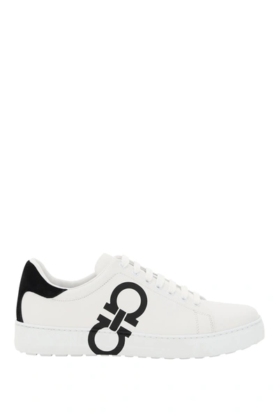 Shop Ferragamo Gancini Sneakers In White Black (white)