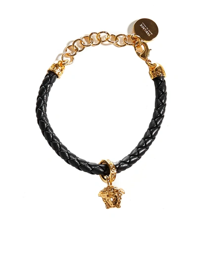 Shop Versace Bracelet In Nero Oro Caldo